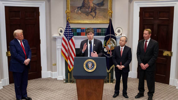 Four men in the white house. Donald Trump watches as Sam Altman speaks from behind the presidential seal.